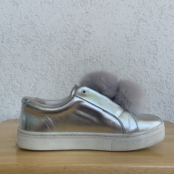 Sam Edelman silver slip on sneakers with faux fur pompoms. - Picture 9 of 12